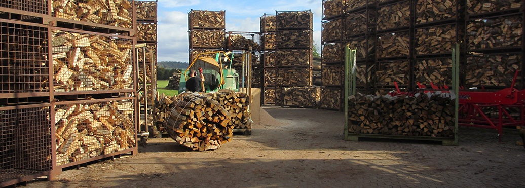 Firewood drying in log cages. Firewood drying in log cages.